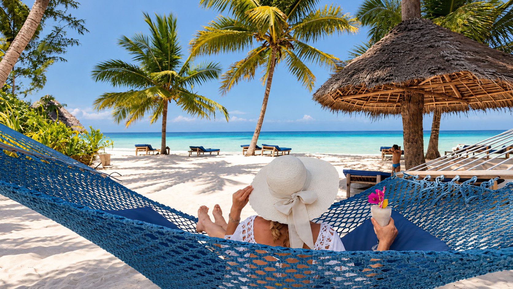 tourist relaxing on a hammock in zanzibar